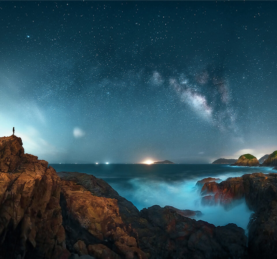 the Milky Way galaxy shining brightly in the night sky. Countless stars twinkle against a backdrop of darkness, creating a stunning visual display that evokes a sense of wonder and amazement.